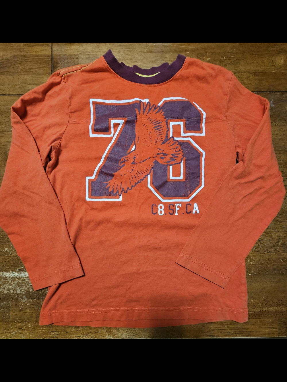 Crazy 8 Orange Longneck Shirt with Purple '76' Eagle Graphic